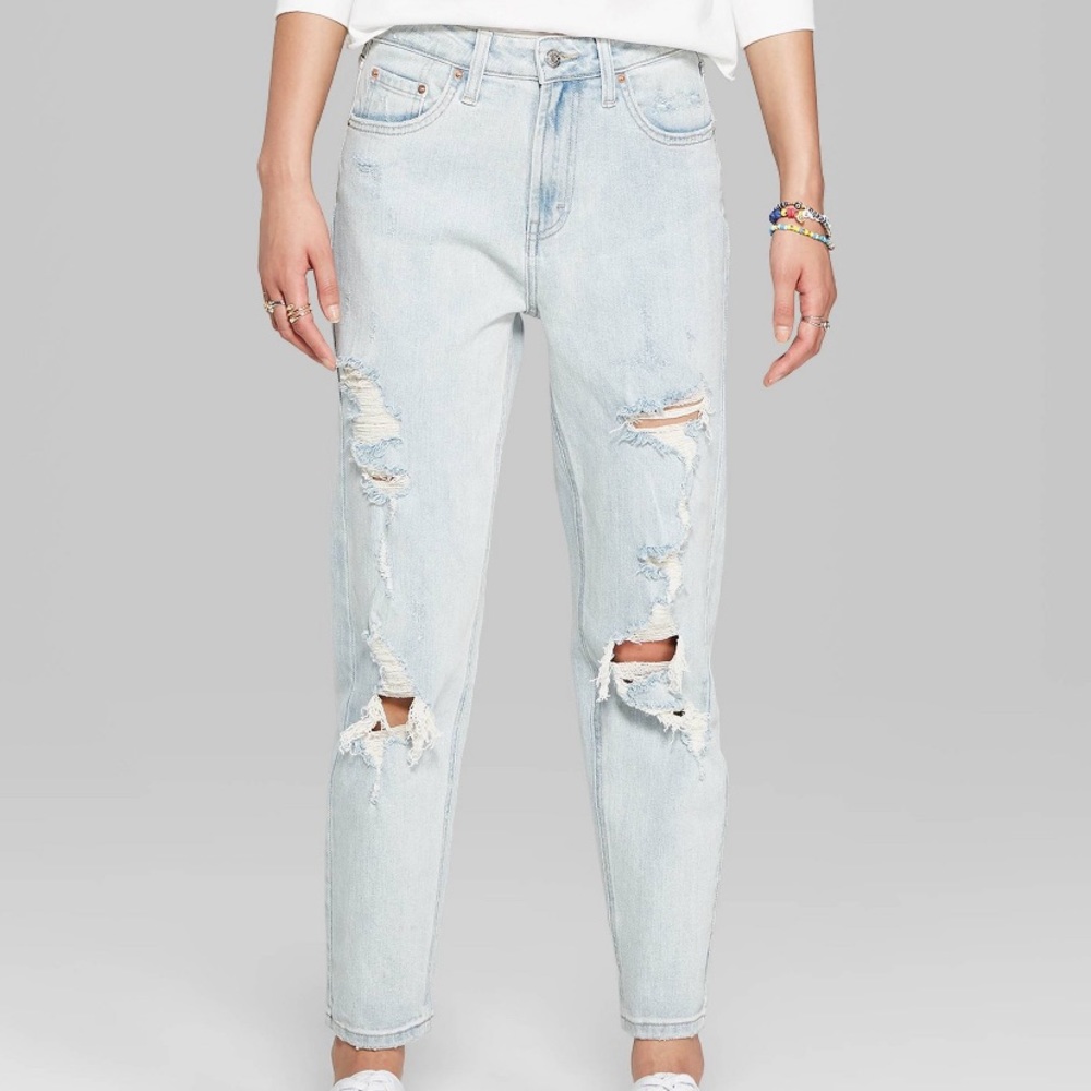 Mom jeans , high rise and distressed